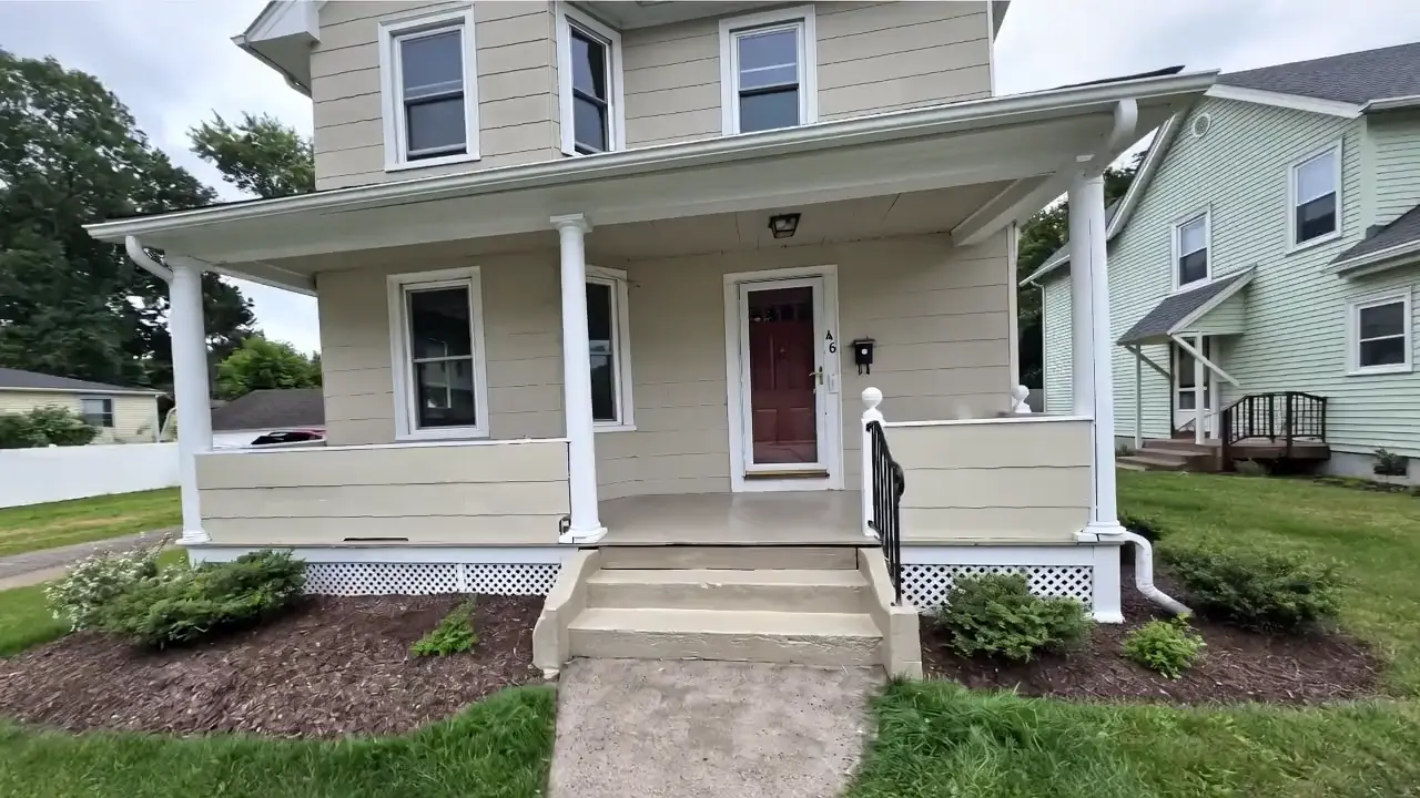 Carpentry contractor installing interior trim in a Connecticut home