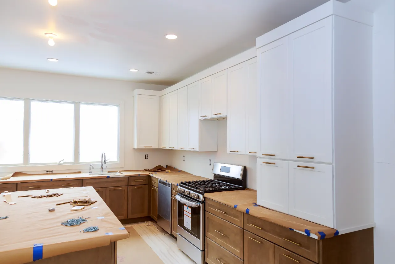 Unfinished kitchen with white cabinets in Connecticut
