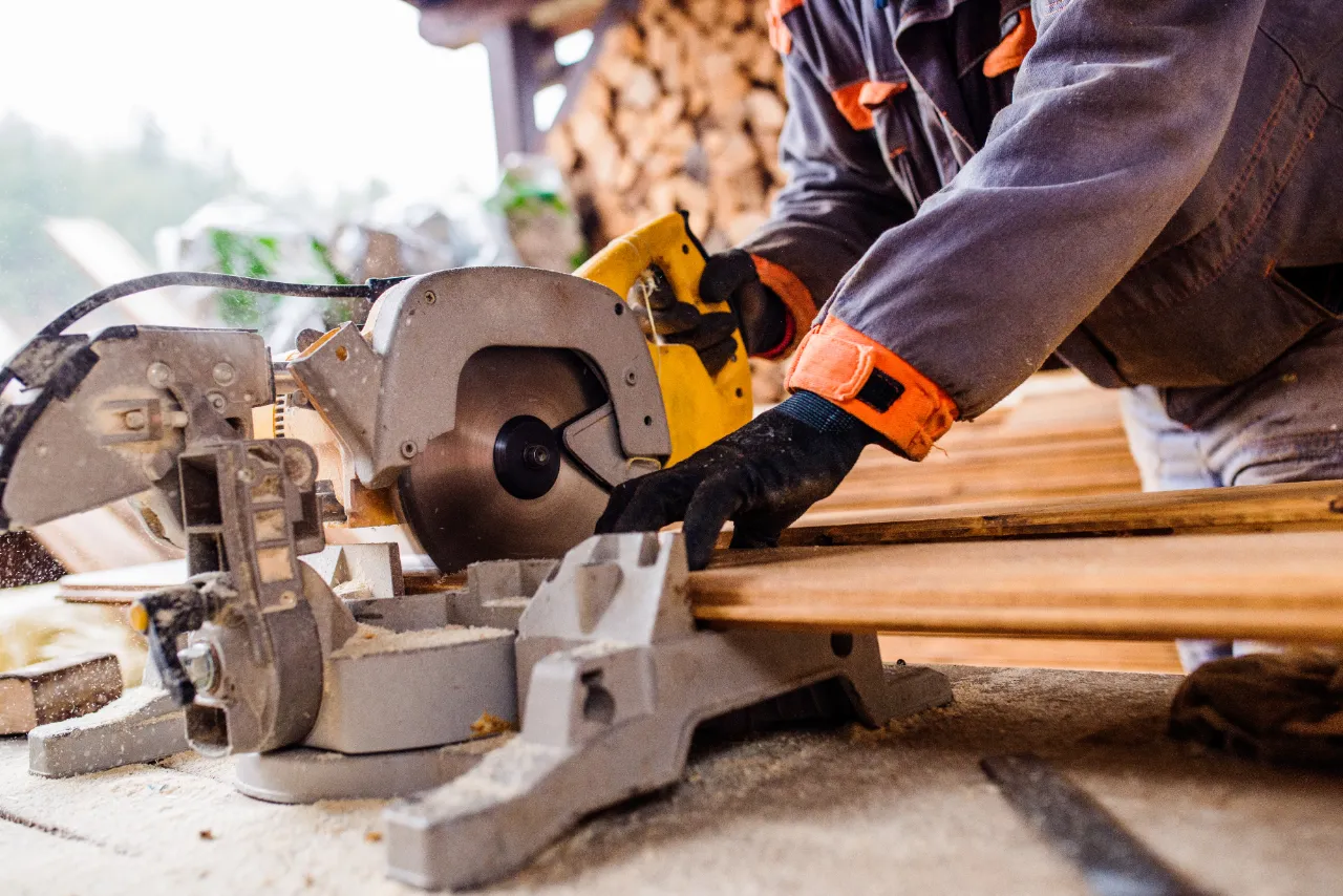 Woodworker using saw for deck project